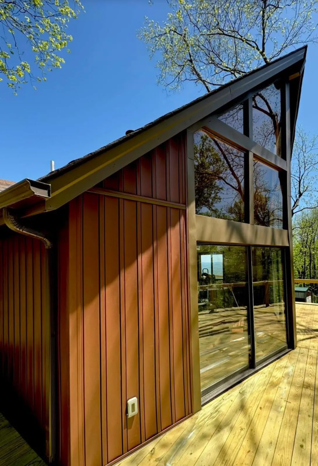 Vertical siding on an A-frame gable