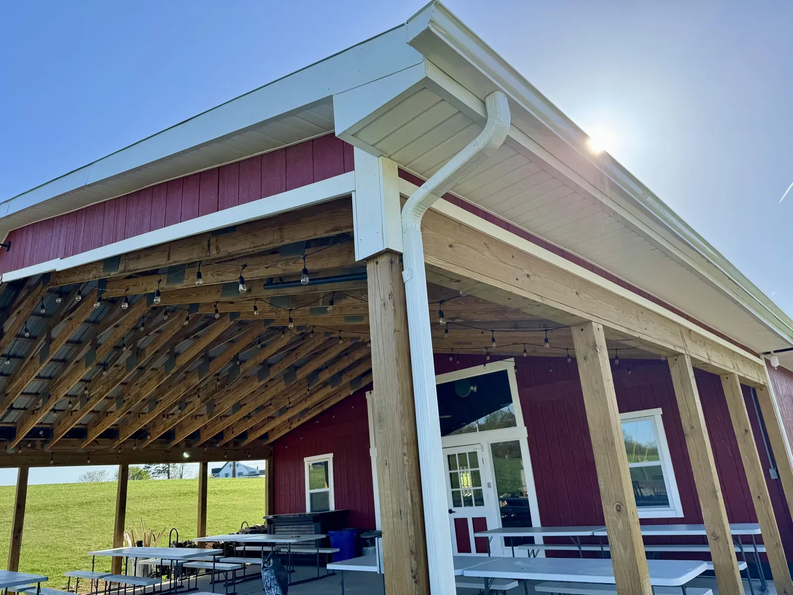 White gutter along a covered patio roof in Stewartsville, VA