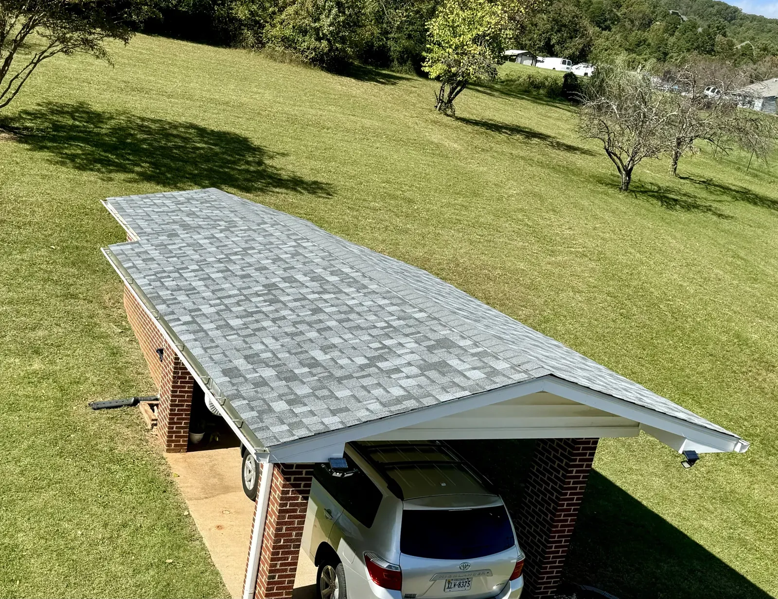Roof edge and gutters over a carport near Roanoke, VA