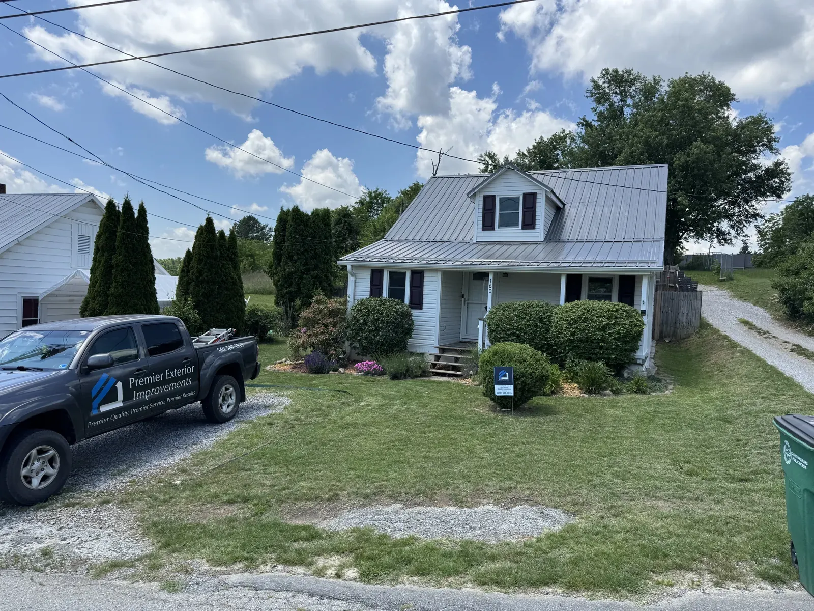 Cape-style home with gutters in Christiansburg, VA