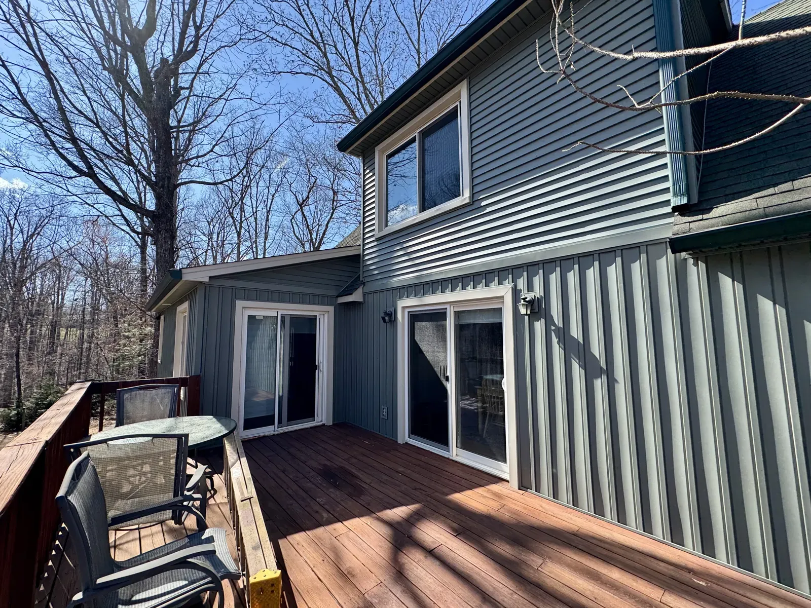 Board and batten and lap siding beside a deck in Moneta, VA