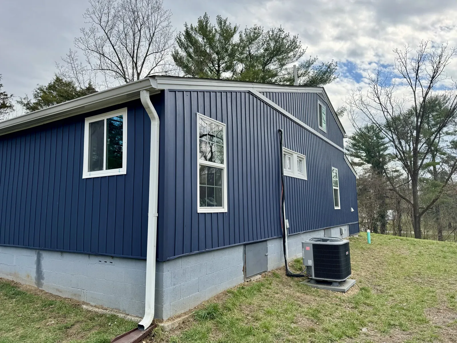 Downspout running to the ground on a home in Vinton, VA